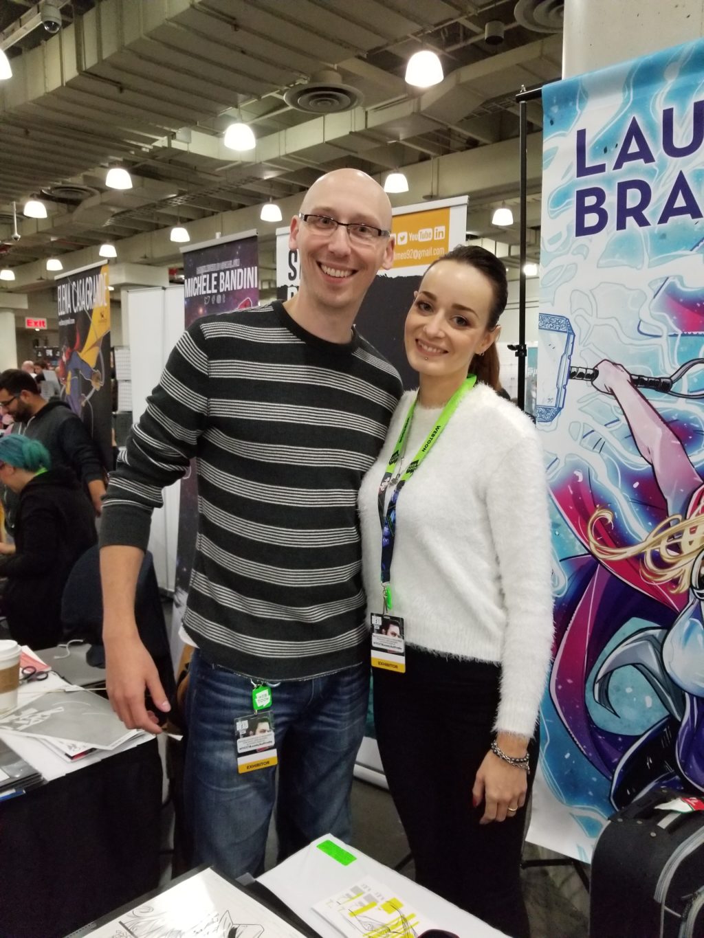 artist laura braga with trevor mueller at new york comic con 2018