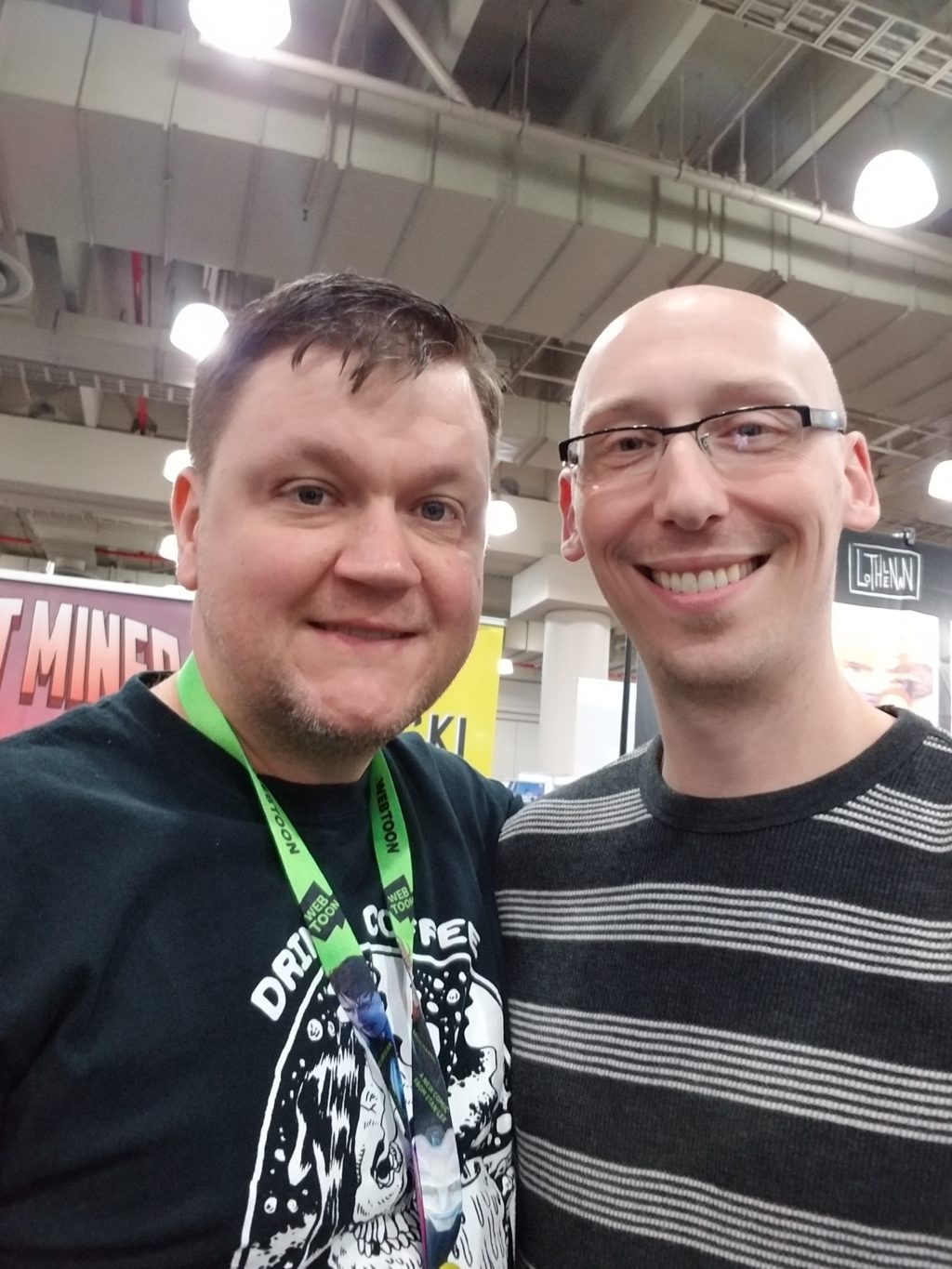 writer eric palicki and trevor mueller in artist alley at nycc 2018