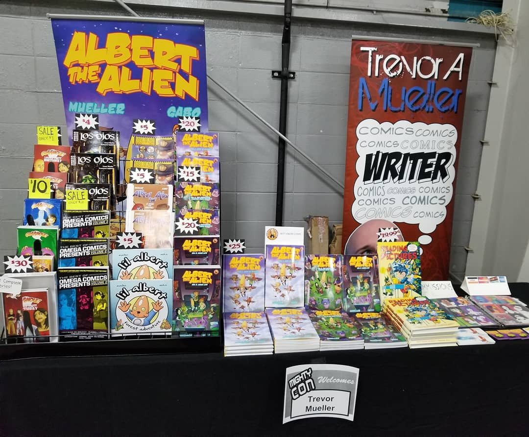 trevor mueller artist alley table mighty con milwaukee 2019