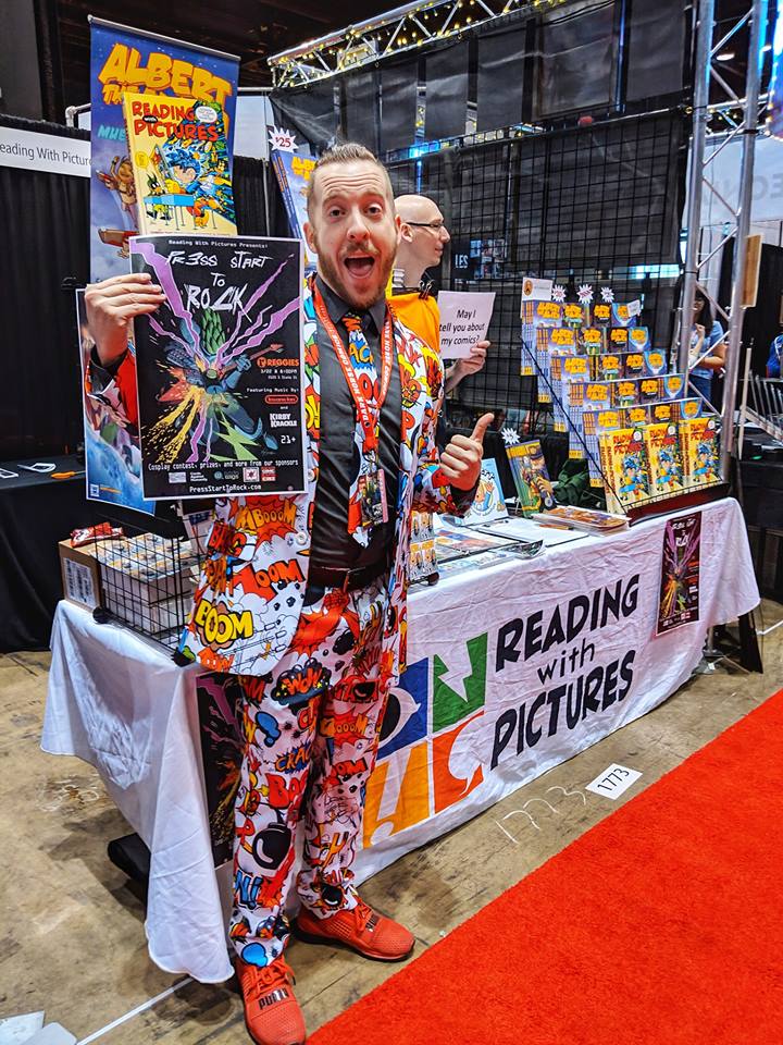 garrett landon clark and trevor mueller reading with pictures booth at c2e2 2019