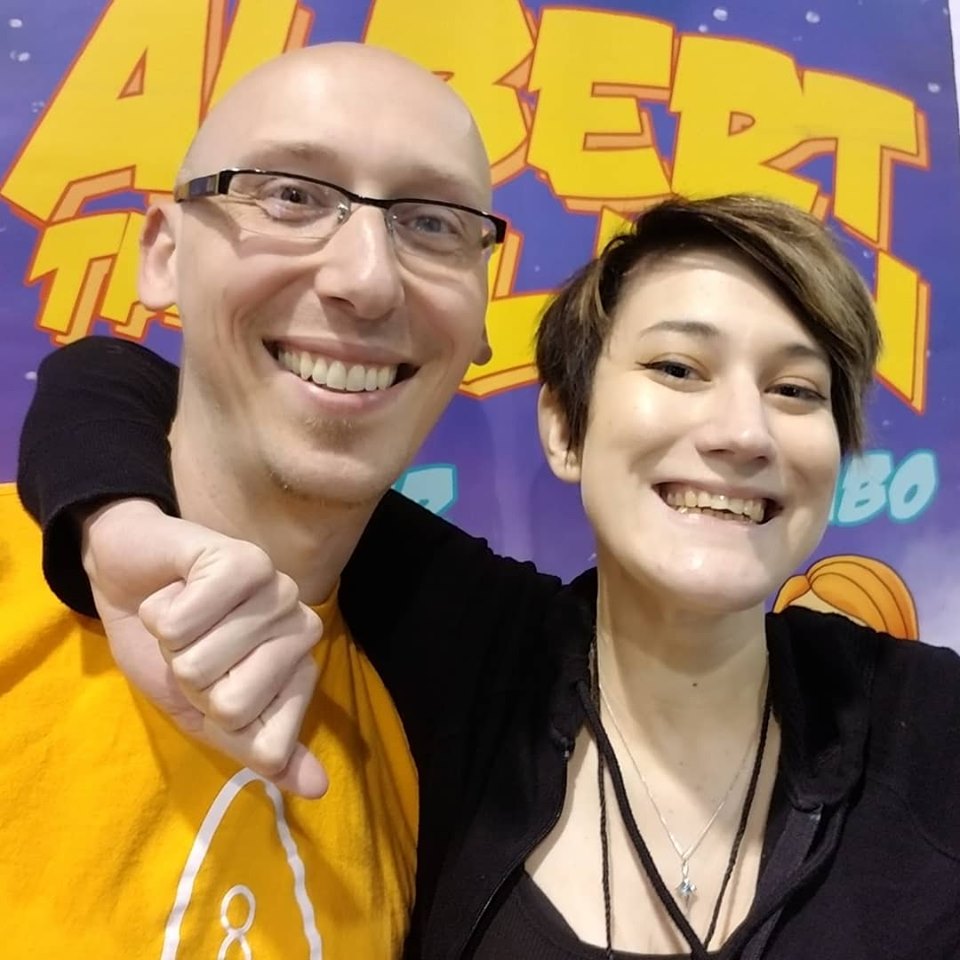 Comic writer and guest Trevor Mueller and volunteer Nikita Rauba at Anime Midwest 2019